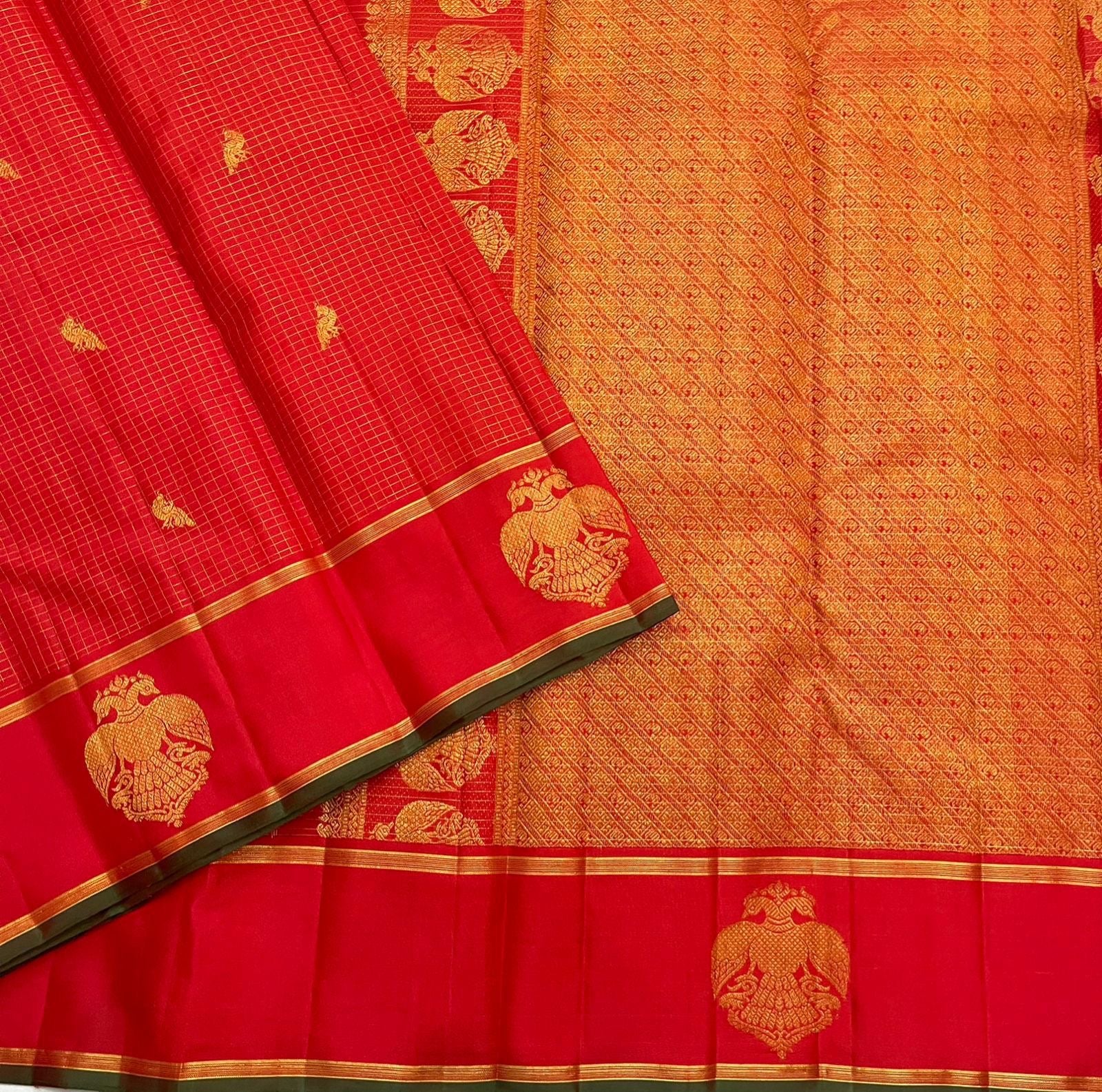 Pure Kanchipuram silk saree pallu in gold zari weave with Gandaberunda motif border, available in the USA