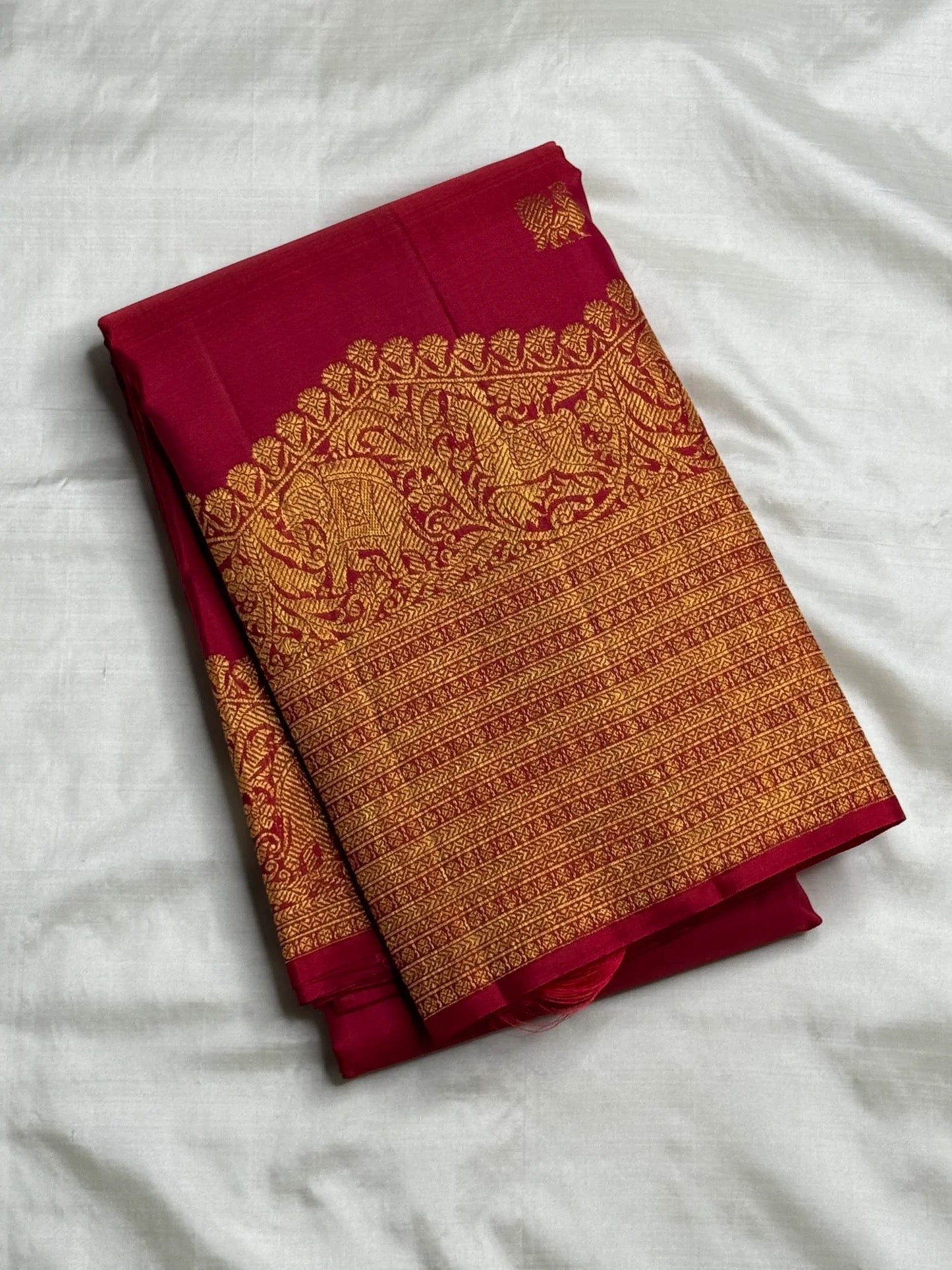 Red Deep Pink double-shade Pure Silk Kanchipuram Butta saree with gold zari motifs and broad Vintage Turning Border.