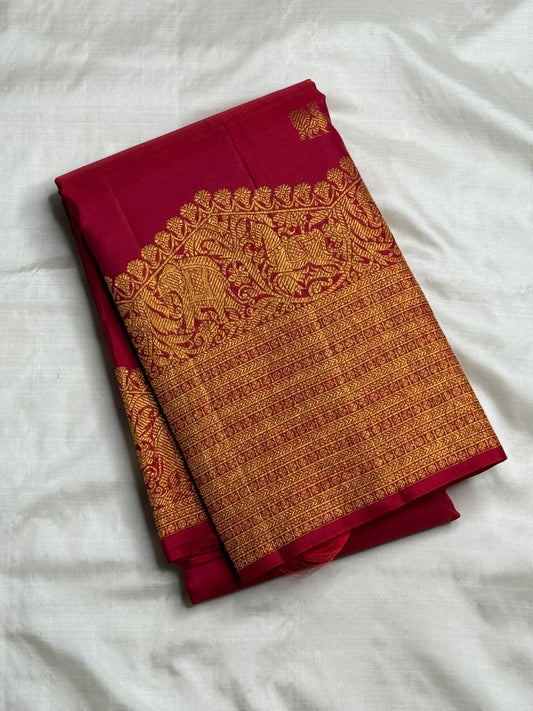 Red Deep Pink double-shade Pure Silk Kanchipuram Butta saree with gold zari motifs and broad Vintage Turning Border.