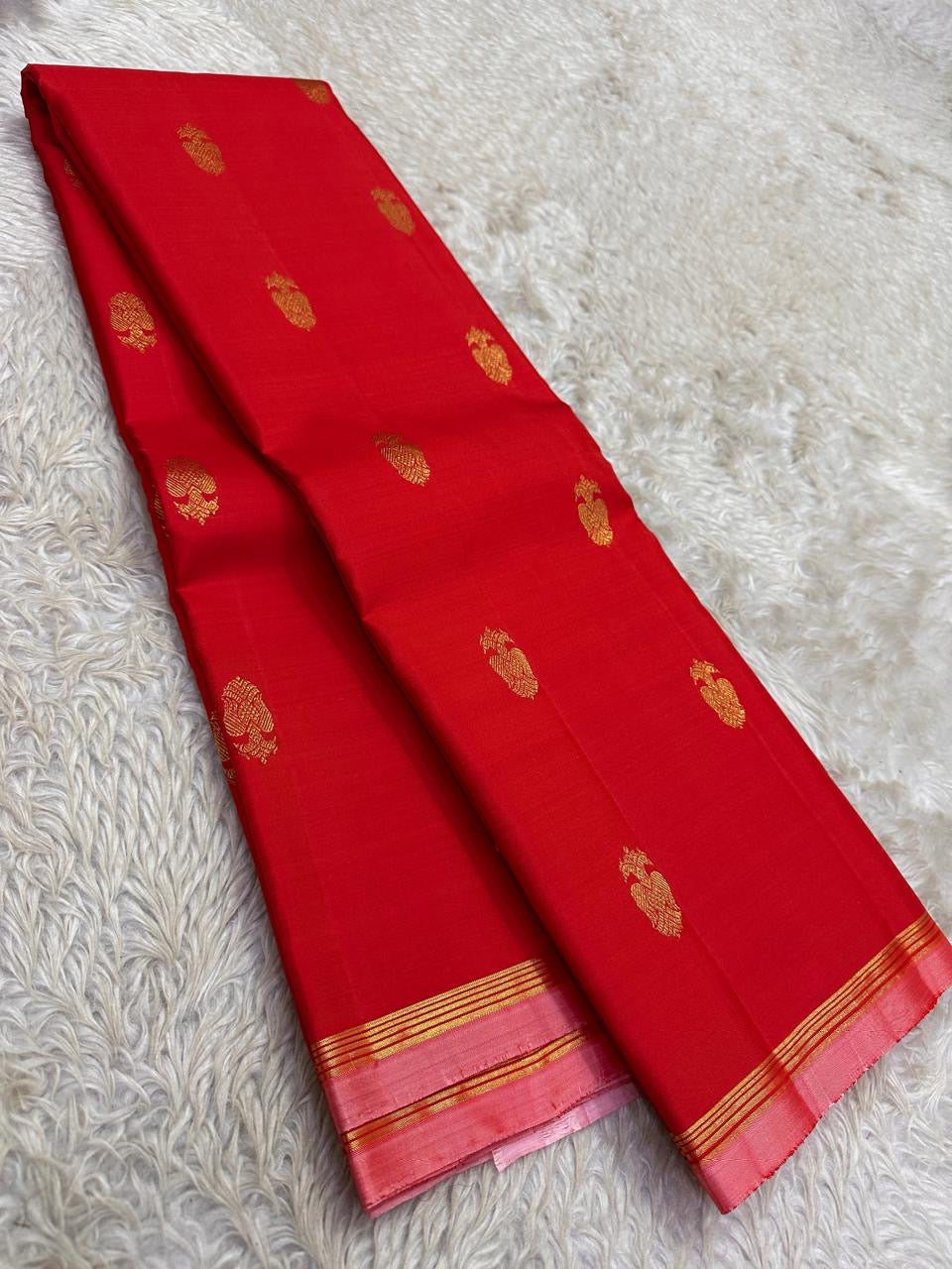 Red Handwoven Pure Silk KanchiPattu Butta Saree with Gandaberunda Gold Zari Motifs and Pink Border