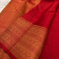 Close-up of red Paimadi Kattam body showing dense structural weave and Gandaberunda butta motifs in gold zari