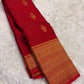 Ornate self-colour red border with dense antique gold zari multi-band floral and geometric motifs