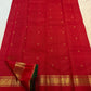Extremely fine gold grid across saturated Red silk.