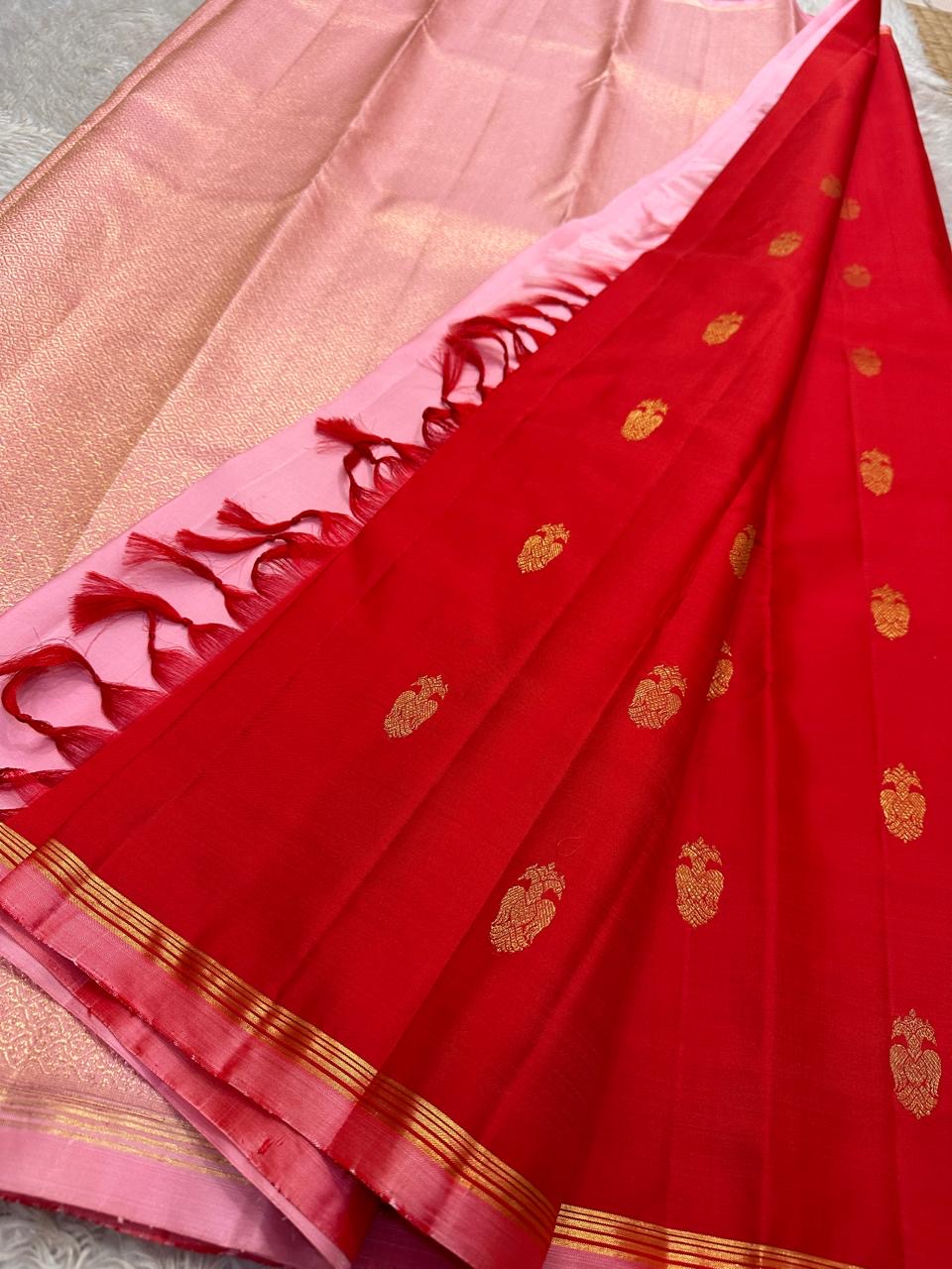 Red Handwoven Pure Silk KanchiPattu Butta Saree with Gandaberunda Gold Zari Motifs and Pink Border