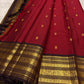 Red handloom korvai Kanjivaram silk saree with traditional gold zari