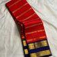 Red Kancheepuram saree with royal blue contrast border detail