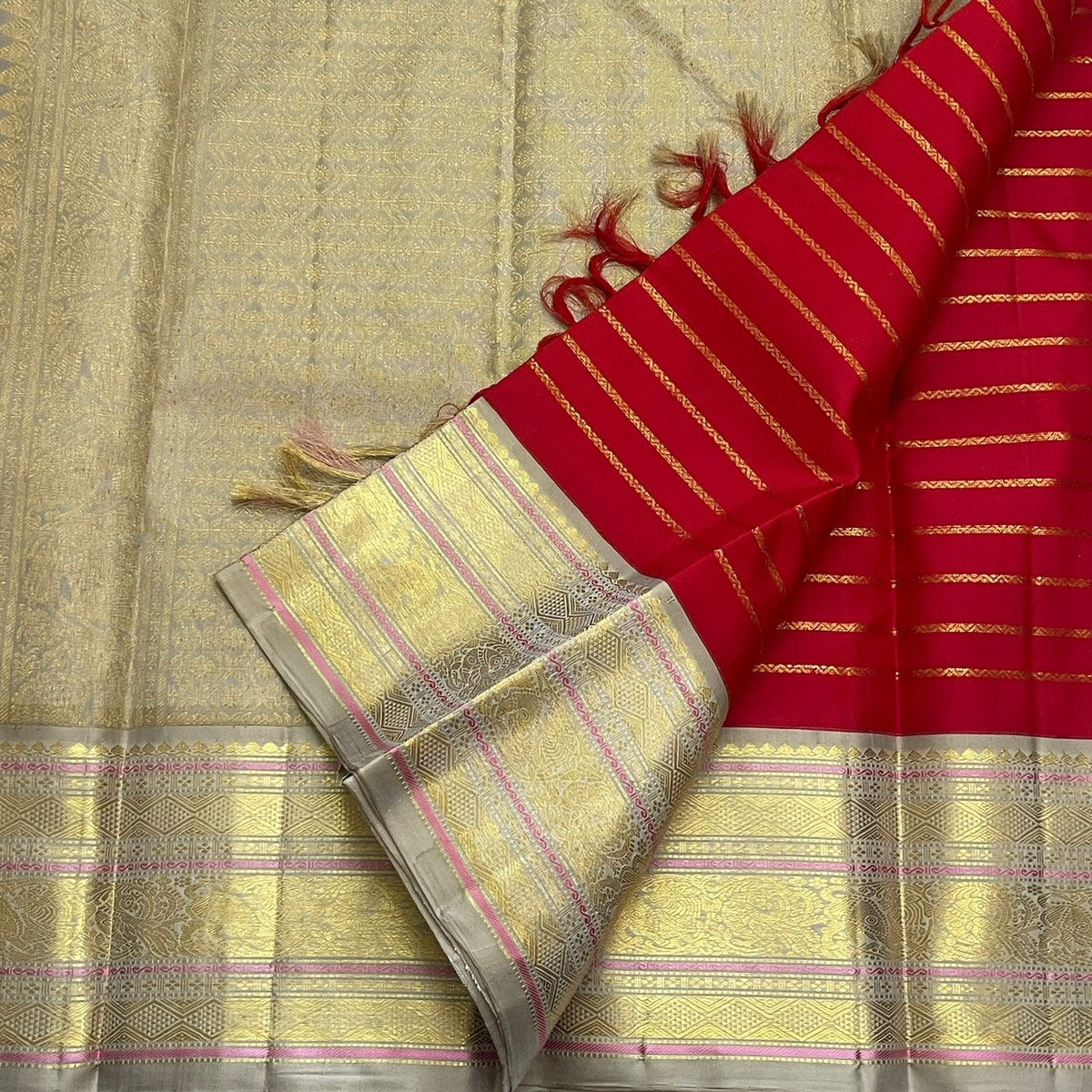Red Kanchipuram saree silk-thread zari border detail