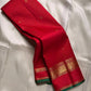 Close textile view of Sindoor red Zari Kattam body with delicate gold lattice and spaced buttas
