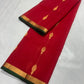 Body detail of crimson-red Katan Silk Chanderi with gold-toned weave