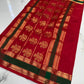 Pallu of crimson red Katan Silk Chanderi saree with rows of gold botanical motifs and forest green zari bands
