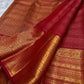 Maanga-inspired curved classic-gold zari forms within the ornamental Kanchipuram border.