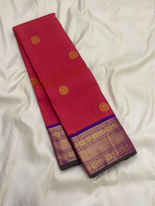 Gold zari coin medallion detail on coral-red shot colour body