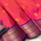 Full coral-red Kanjeevaram Korvai saree folded view