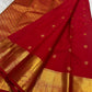Gold zari mayil chakram roundel detail on red body