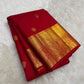 Wide gold zari peacock-and-bird border close-up
