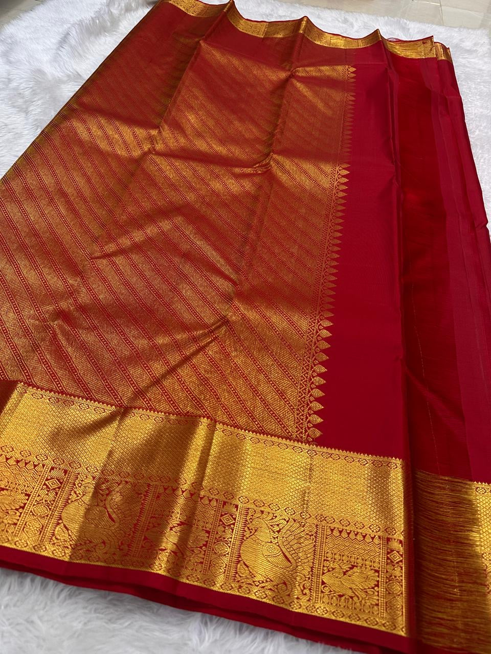 Red handwoven pure silk Kanchi Pattu saree with Mayil Chakram zari motifs — Idam Living
