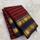 Pillar box red Kanchi Pattu saree, midnight navy Rettapet border detail