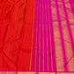 Red orange Kancheevaram silk saree with raspberry pink seer pallu – festive occasion
