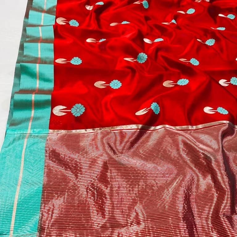 Red and Aqua Blue Chanderi silk saree showing floral buttas, contrast border and metallic striped pallu
