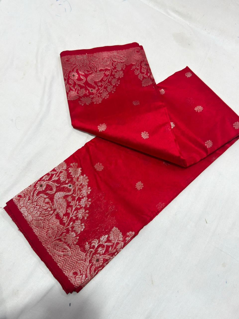 Deep red Pattu Silk Chanderi saree with silver-toned floral border