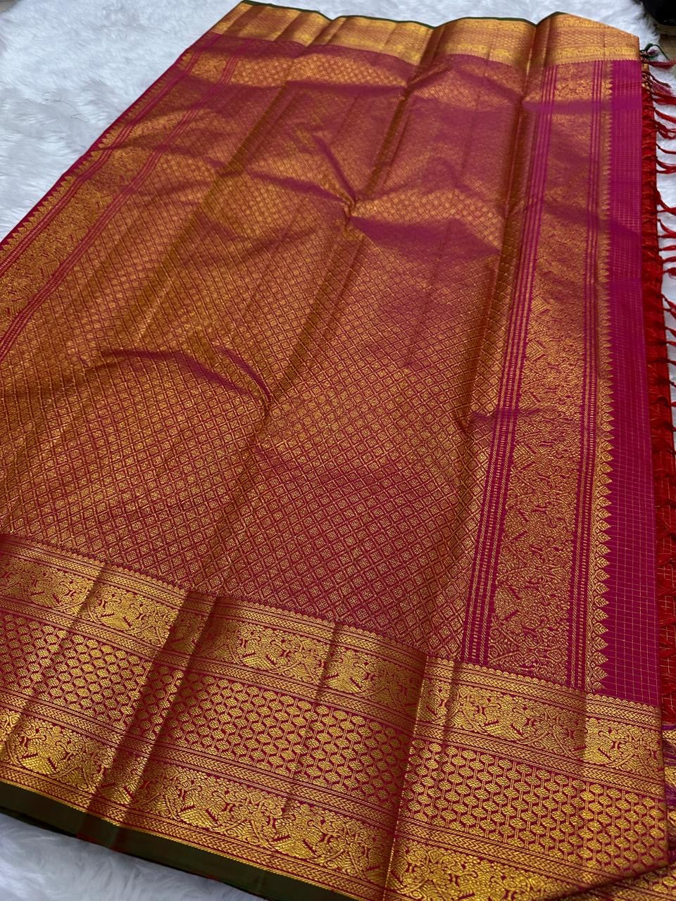 Wide gold zari border and pallu layout of red and pink Kanchipuram silk saree, shipped from New Jersey USA
