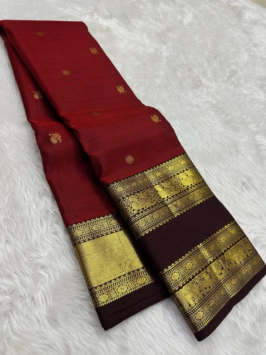 Deep vermilion red pure silk Kanchi saree with geometric border – full overview