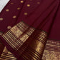 Red Pure Silk Kanchipuram Varisaipet saree with gold zari buttas.