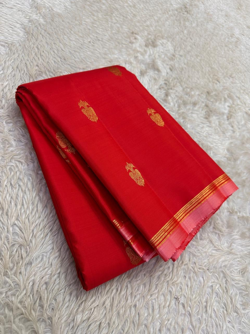 Red Handwoven Pure Silk KanchiPattu Butta Saree with Gandaberunda Gold Zari Motifs and Pink Border