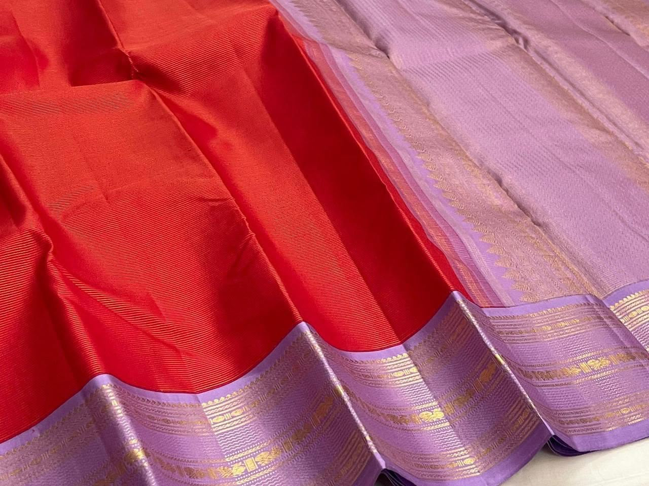 Red Vairaoosi silk with continuous needle-zari shimmer detail