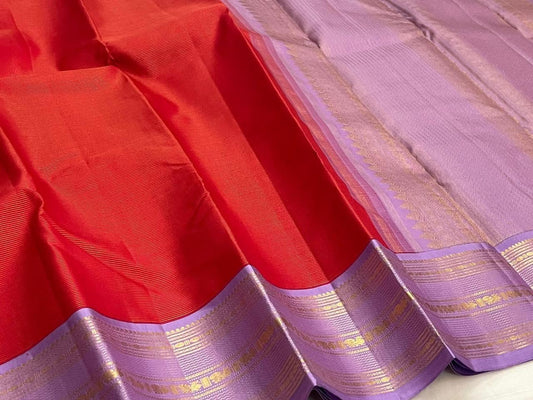 Red Vairaoosi silk with continuous needle-zari shimmer detail