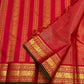 Red saree pallu with vertical gold zari stripes and tassels, showing woven border with forest green edging.