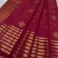 Gold zari bands and medallions on Rani Pink pure silk Kanchipuram saree