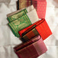 Vermilion Orange Handwoven Pure Silk KanchiPattu Saree with Rettapet Lines and Rust Manthulir Border