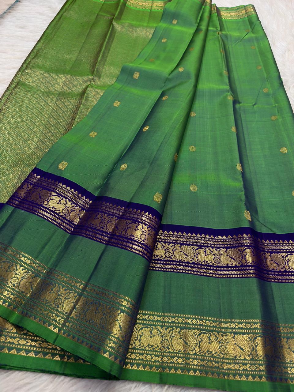 Leaf Green Handwoven Pure Silk Kanjipuram Rettapet Saree with Navy Blue Bird Motif Gold Zari Border