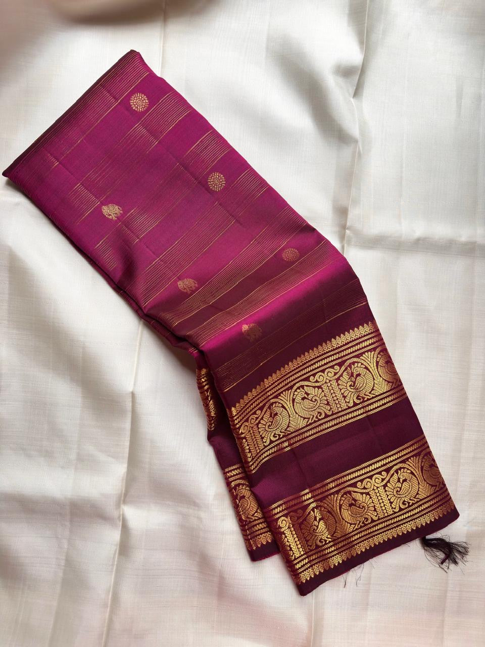 Rich Magenta Handwoven Pure Silk Kancheepuram Saree with Rettapet and Peacock Border