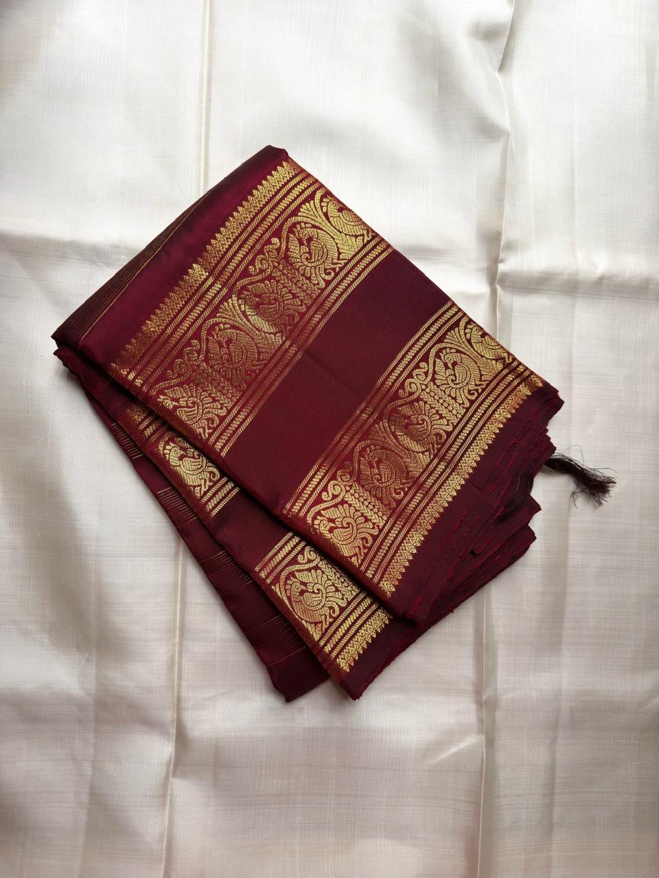 Rich Magenta Handwoven Pure Silk Kancheepuram Saree with Rettapet and Peacock Border