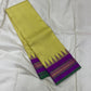 angled fold view of chartreuse grid checked kanchipuram silk saree showing purple zari woven border