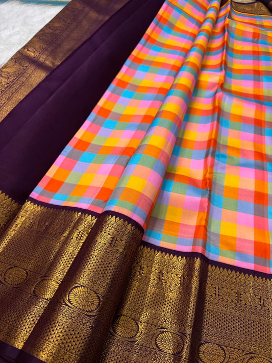 Deep aubergine contrast border with densely woven gold florals | Kanjipuram pure silk saree.