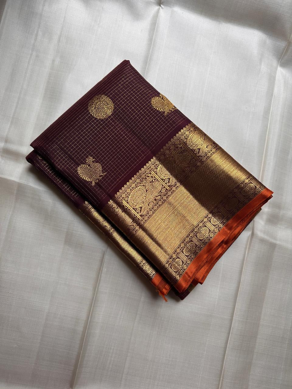 Rich Burgundy Kanjipuram silk saree folded view