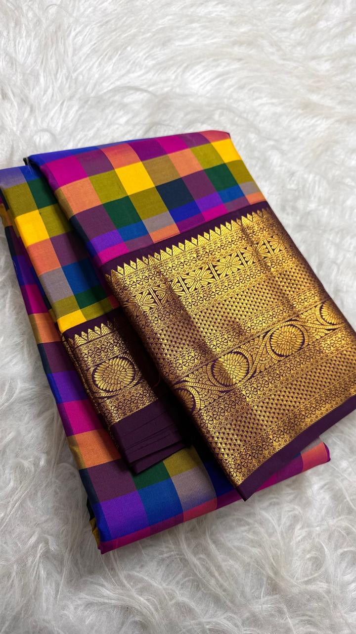 Aubergine-purple saree border with ornate gold floral medallions | Kancheepuram pure silk saree.