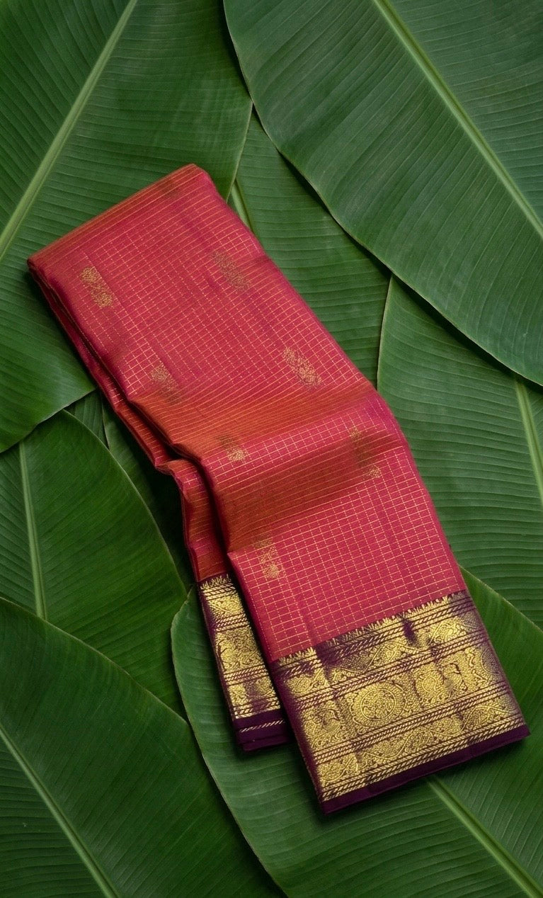 Zari kattam body weave close-up on rose orange shot colour Kanchipuram saree — Idam Living