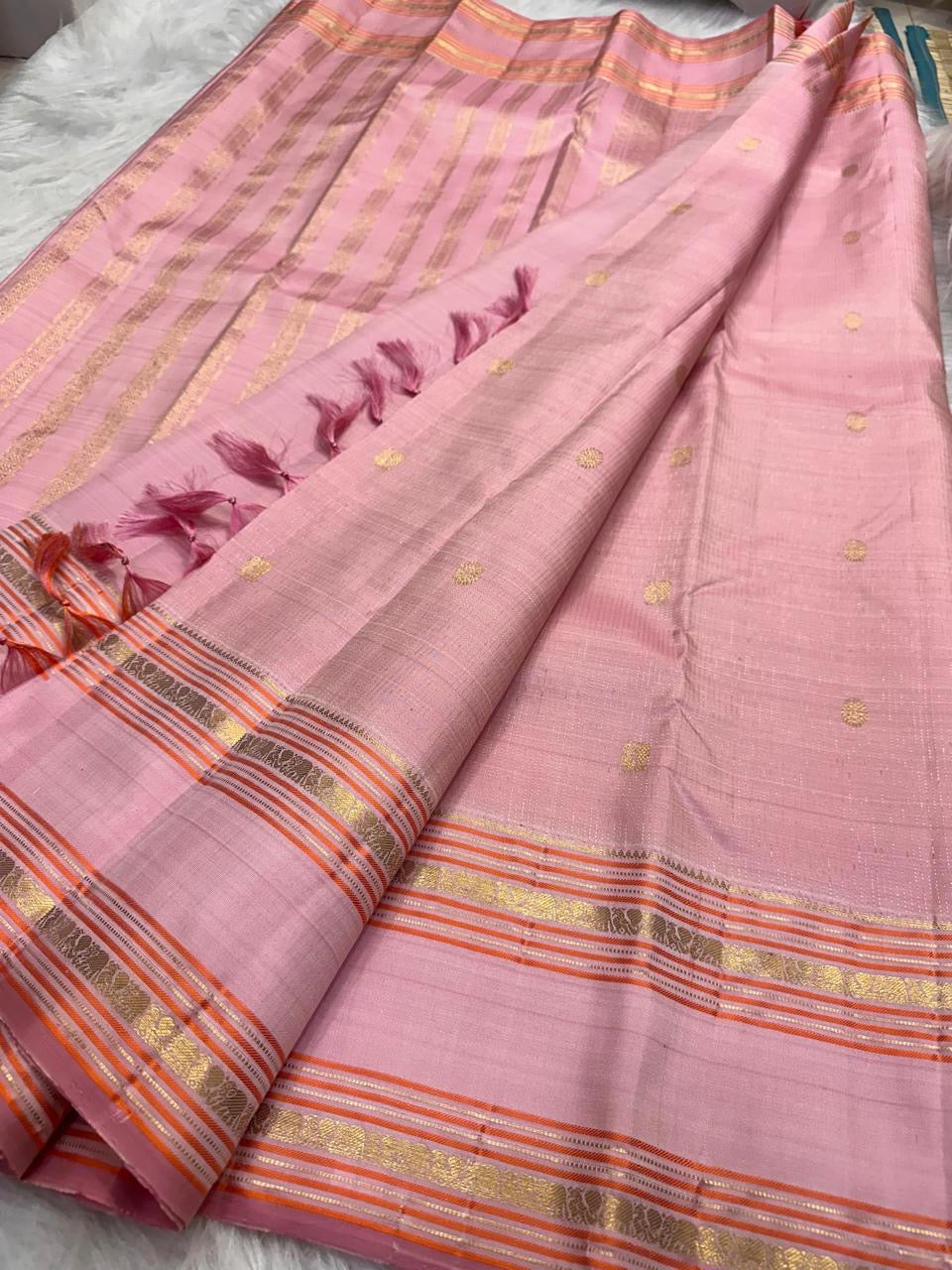 Rose Petal Pink Kanjeevaram silk saree with Oosivaanam Vairaoosi-inspired weave detail