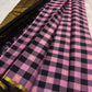 Handwoven pink and black Kanchipuram silk saree with precision checker pattern