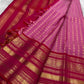 Rose pink Kancheepuram silk body close-up showing petite mayil chakram butta motifs