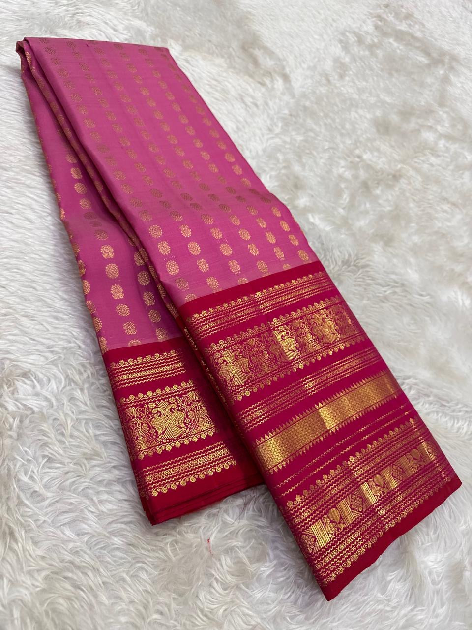 Rose pink Kancheepuram silk saree folded, full view