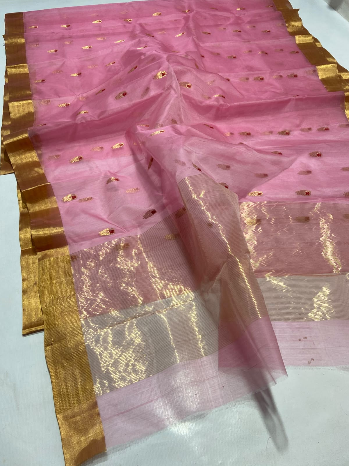 Pallu of rose pink Tissue Chanderi saree with shimmering champagne-silver tissue weave
