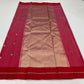 Rose pink Pattu Silk Chanderi saree opened to show red silk border, scattered woven buttas and metallic pallu