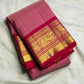 Close-up of delicately handwoven zari buttas on rose pink Kanjeevaram Korvai silk saree