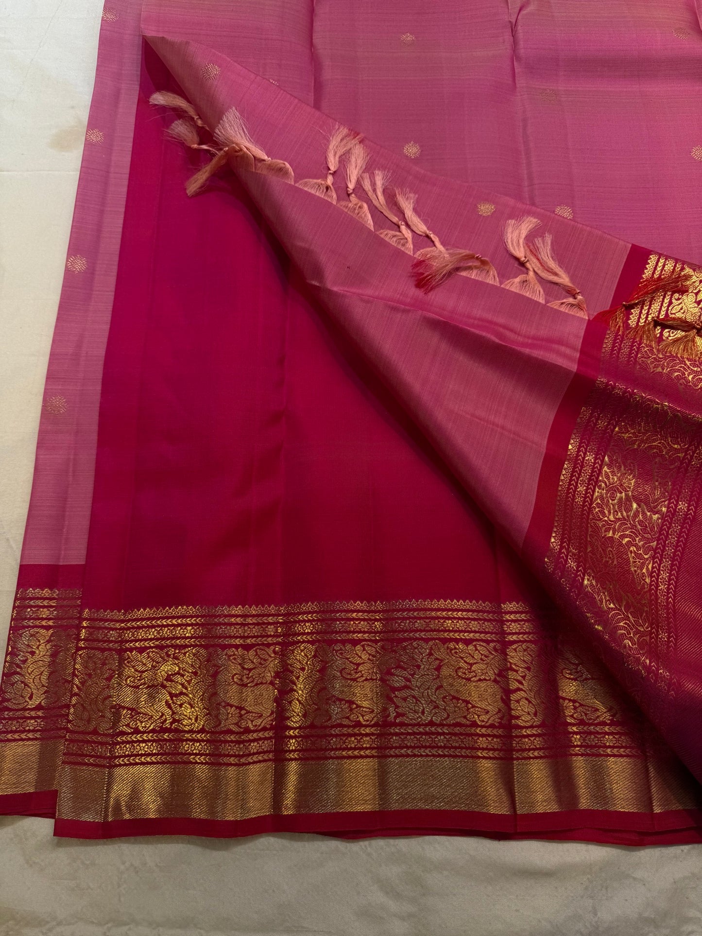 Splendidly woven grand zari pallu on rose pink pure silk Kanjeevaram saree