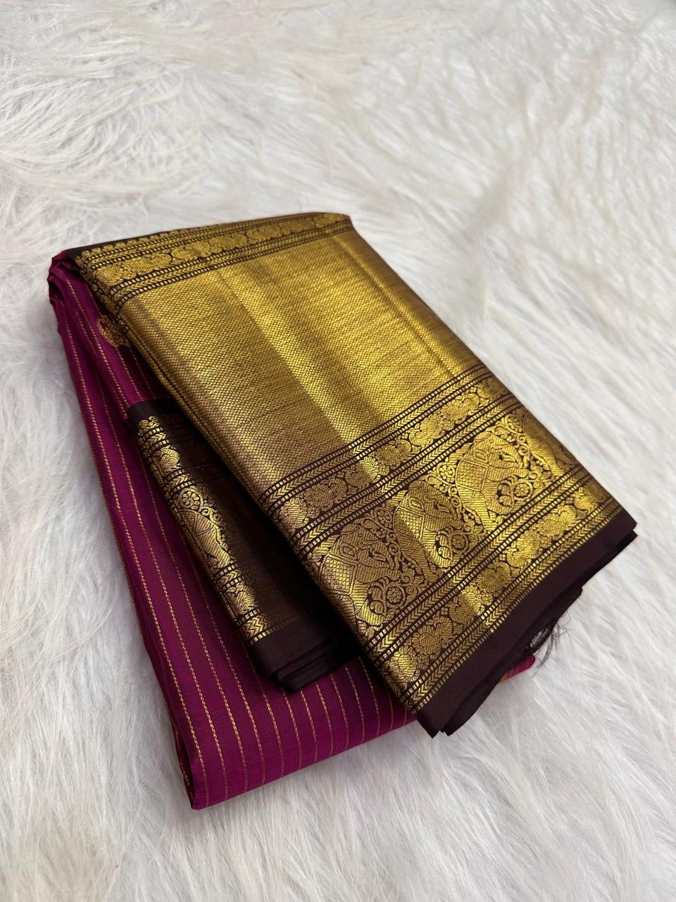 Fine hand-laid gold oosivaanam stripes across vadamalli pink and antique gold silk